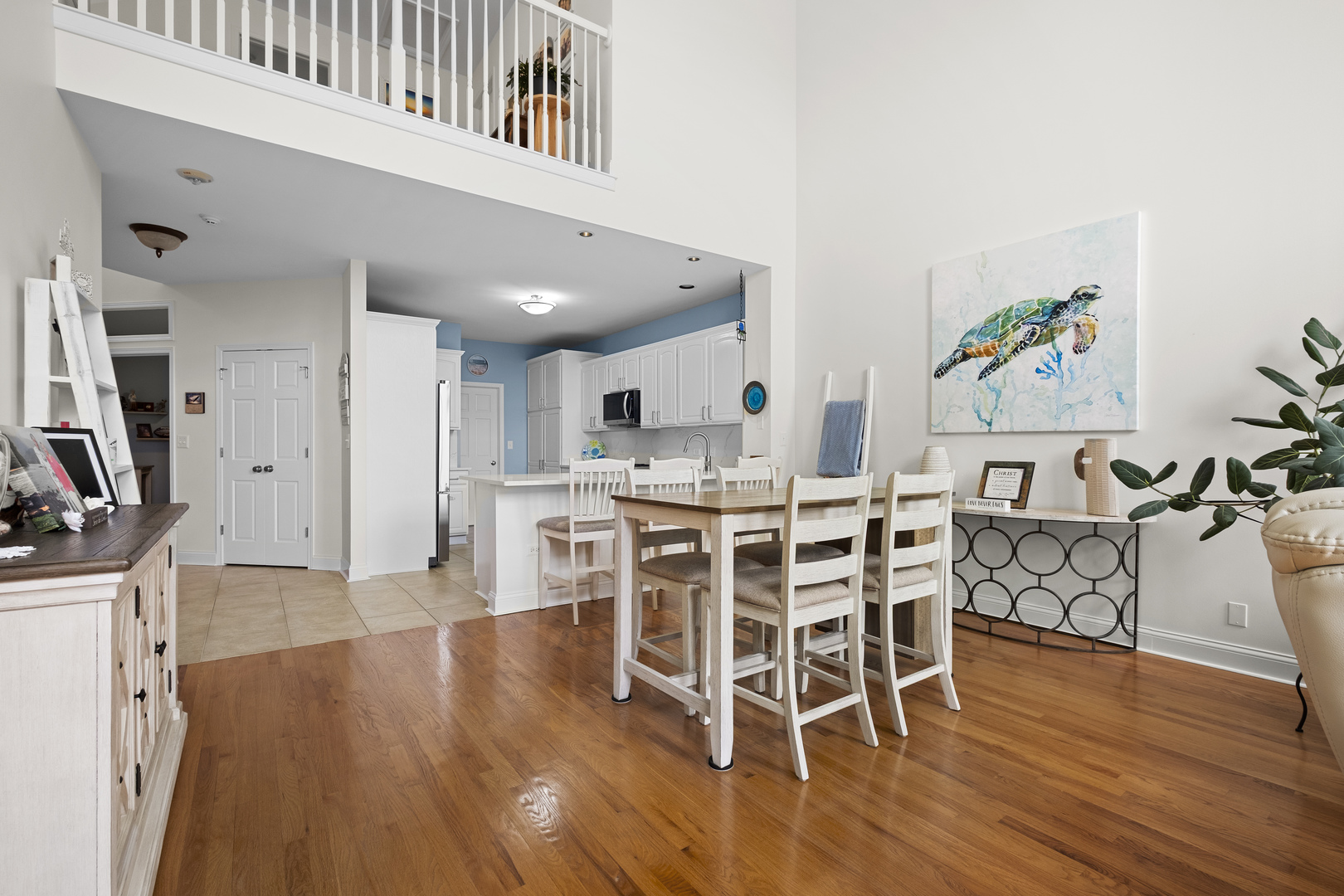 1076 Inverness Drive Antioch, IL 60002 - Photo 11 of 39 a view of a dining room with furniture and wooden floor