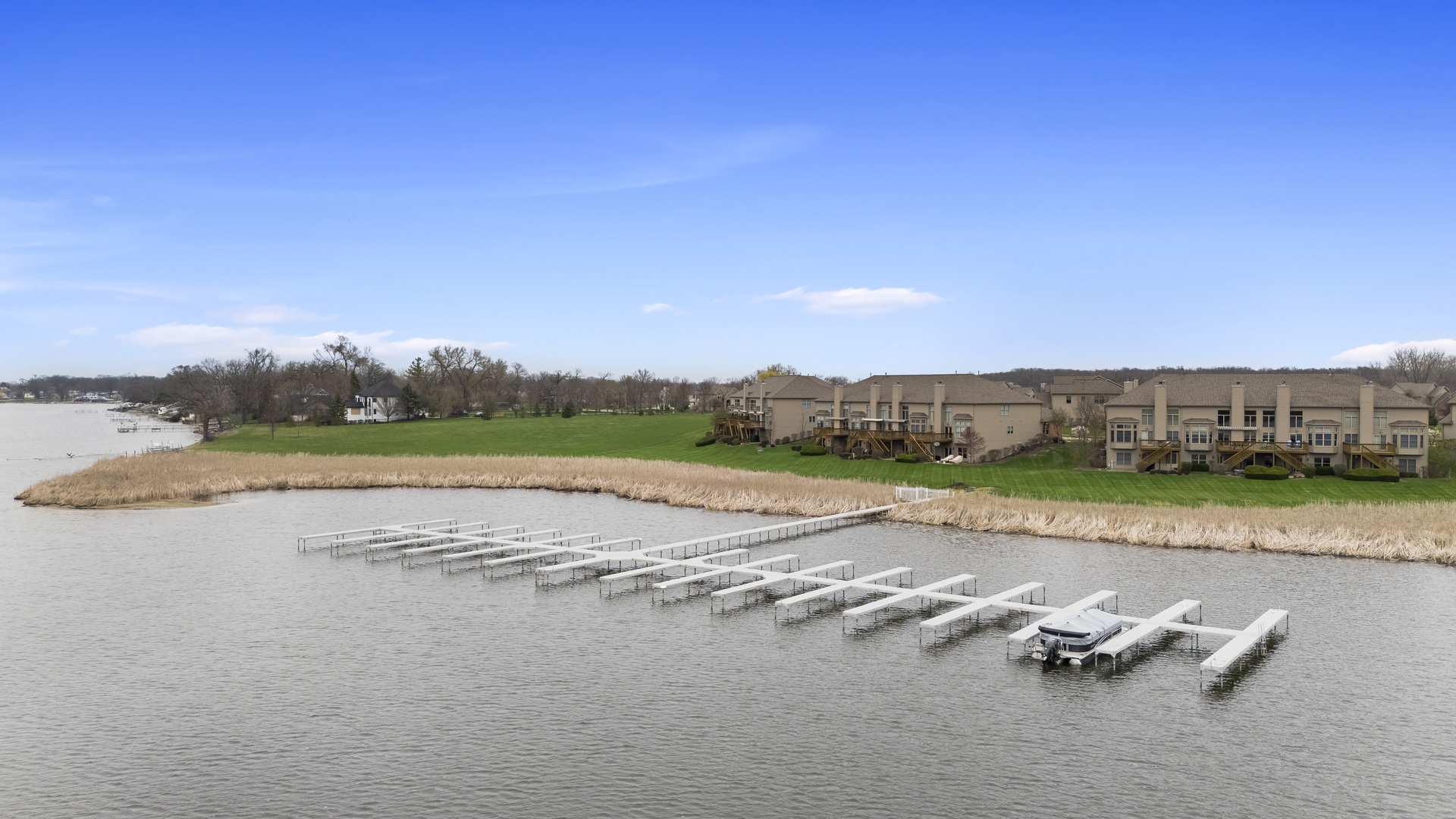 1076 Inverness Drive Antioch, IL 60002 - Photo 2 of 39 a view of a lake with houses