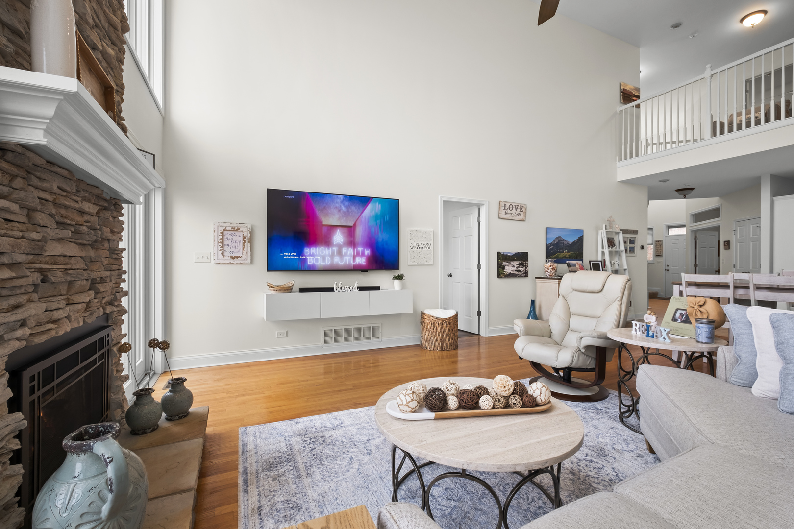 1076 Inverness Drive Antioch, IL 60002 - Photo 21 of 39 a living room with furniture and a flat screen tv