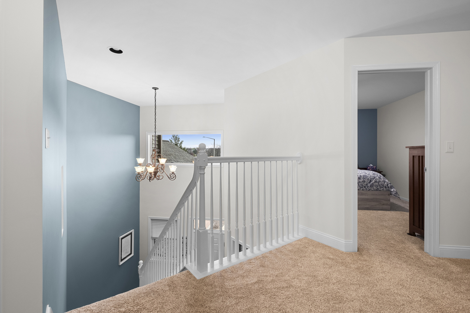 1076 Inverness Drive Antioch, IL 60002 - Photo 22 of 39 a view of a hallway to a room with stairs