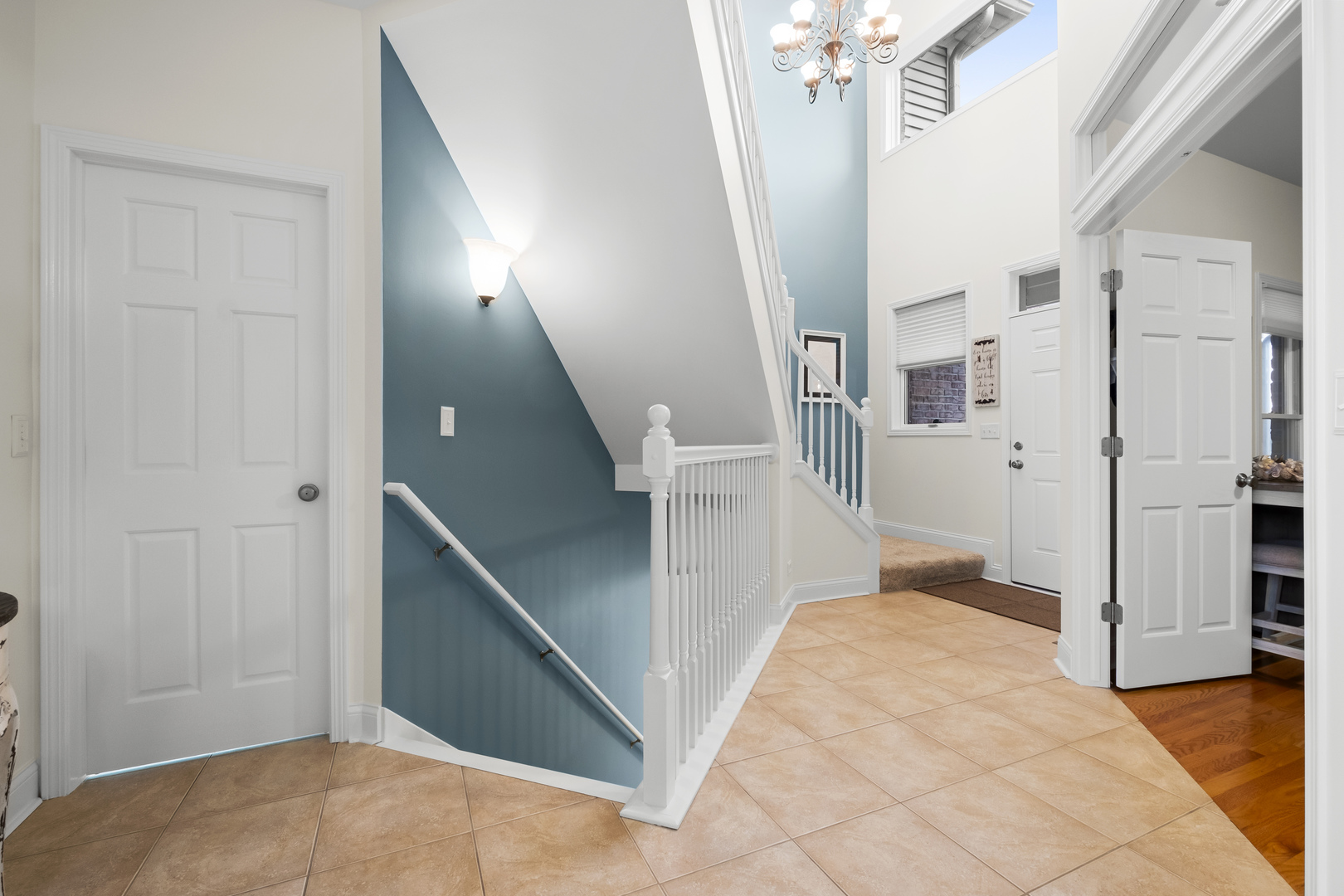 1076 Inverness Drive Antioch, IL 60002 - Photo 26 of 39 a view of a hallway with a chandelier and entryway