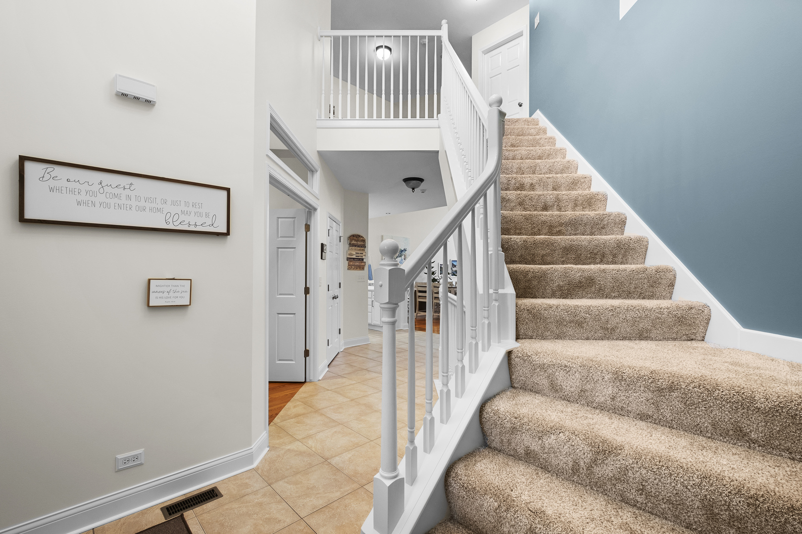 1076 Inverness Drive Antioch, IL 60002 - Photo 5 of 39 a view of entryway and hall with wooden floor
