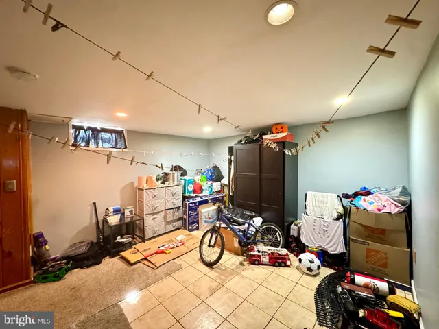 a view of gym equipment and children play room