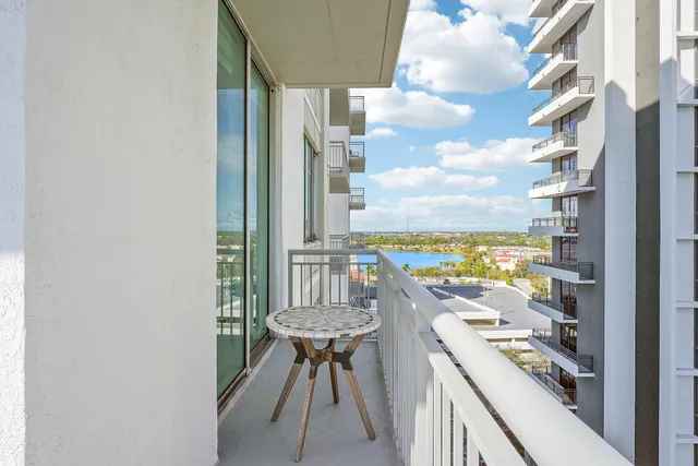 a view of a chairs and table in a patio
