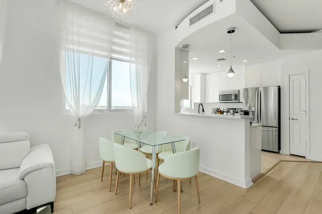 a view of kitchen with cabinets and stainless steel appliances