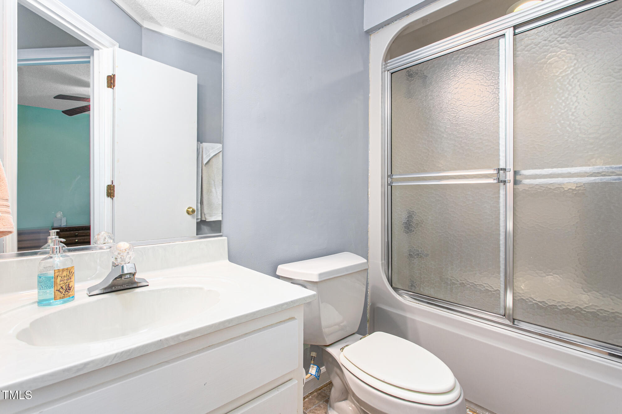 809 Brookview Drive Elon, NC 27244 - Photo 27 of 53 a bathroom with a sink toilet and shower