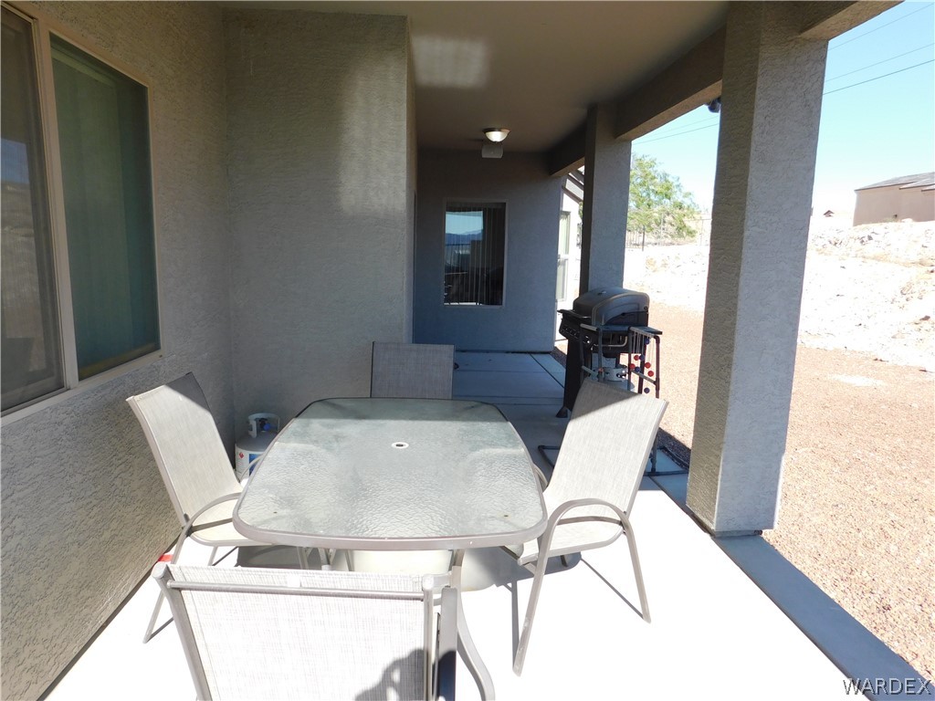 3370 South Ridge Avenue Bullhead City, AZ 86429 - Photo 21 of 56 a living room with furniture and window
