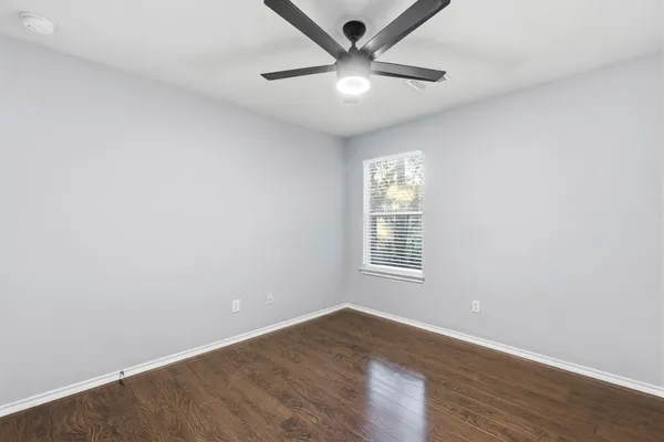 a bathroom with a sink a toilet tub and shower