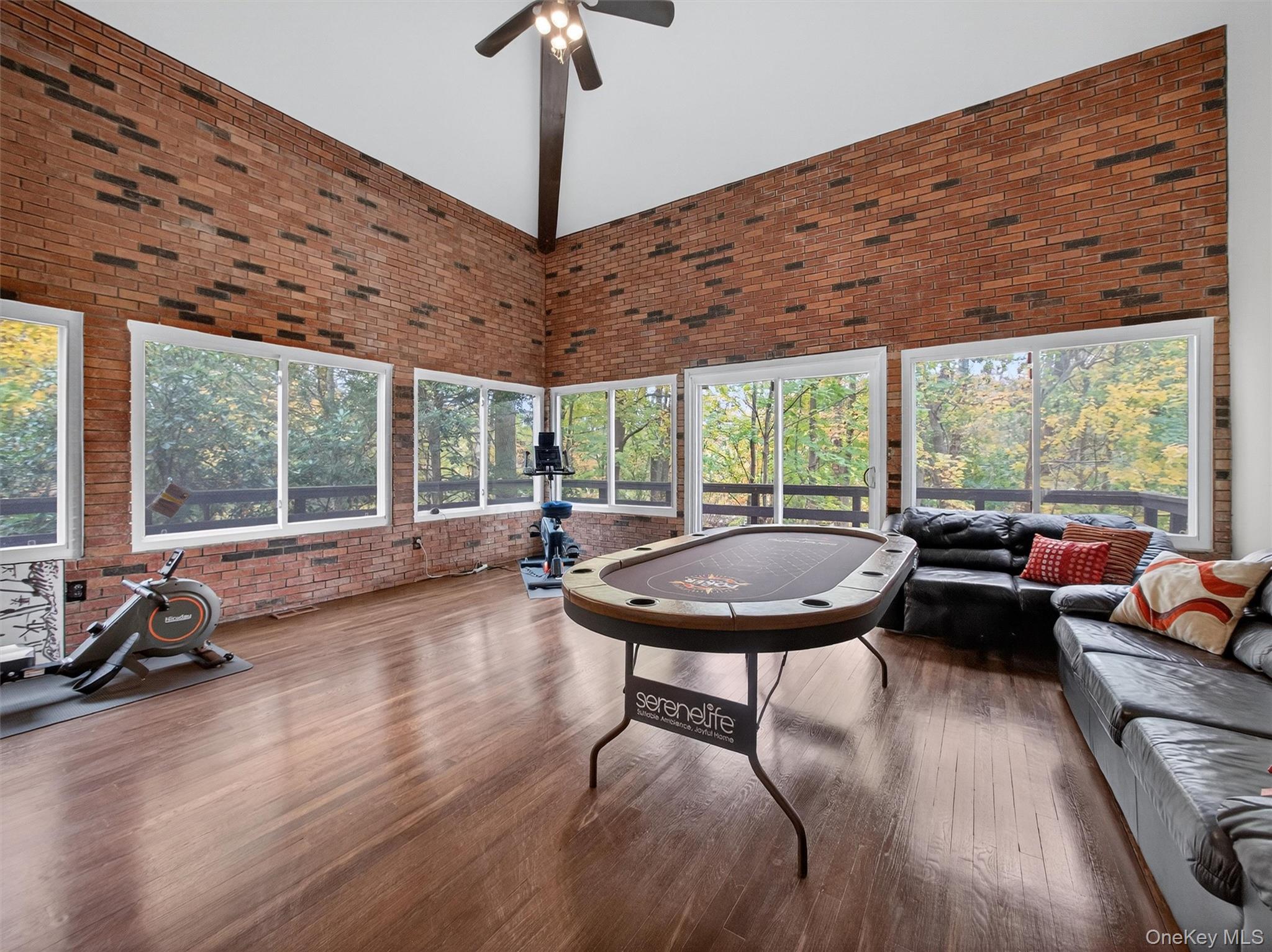 2 Kings Gate Road Suffern, NY 10901 - Photo 25 of 50 a living room with furniture a wooden floor and a large window