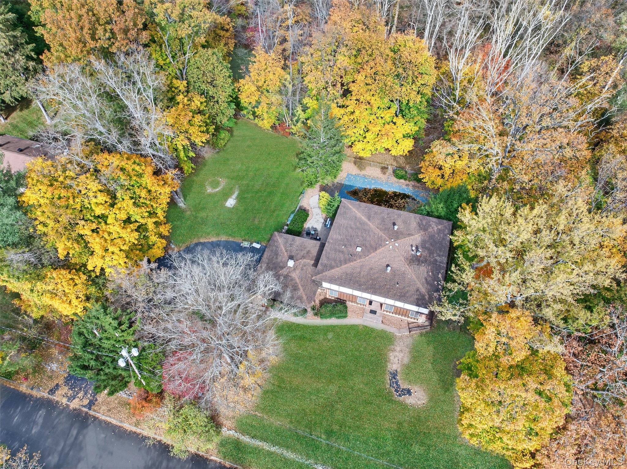2 Kings Gate Road Suffern, NY 10901 - Photo 3 of 50 an aerial view of a house with a yard