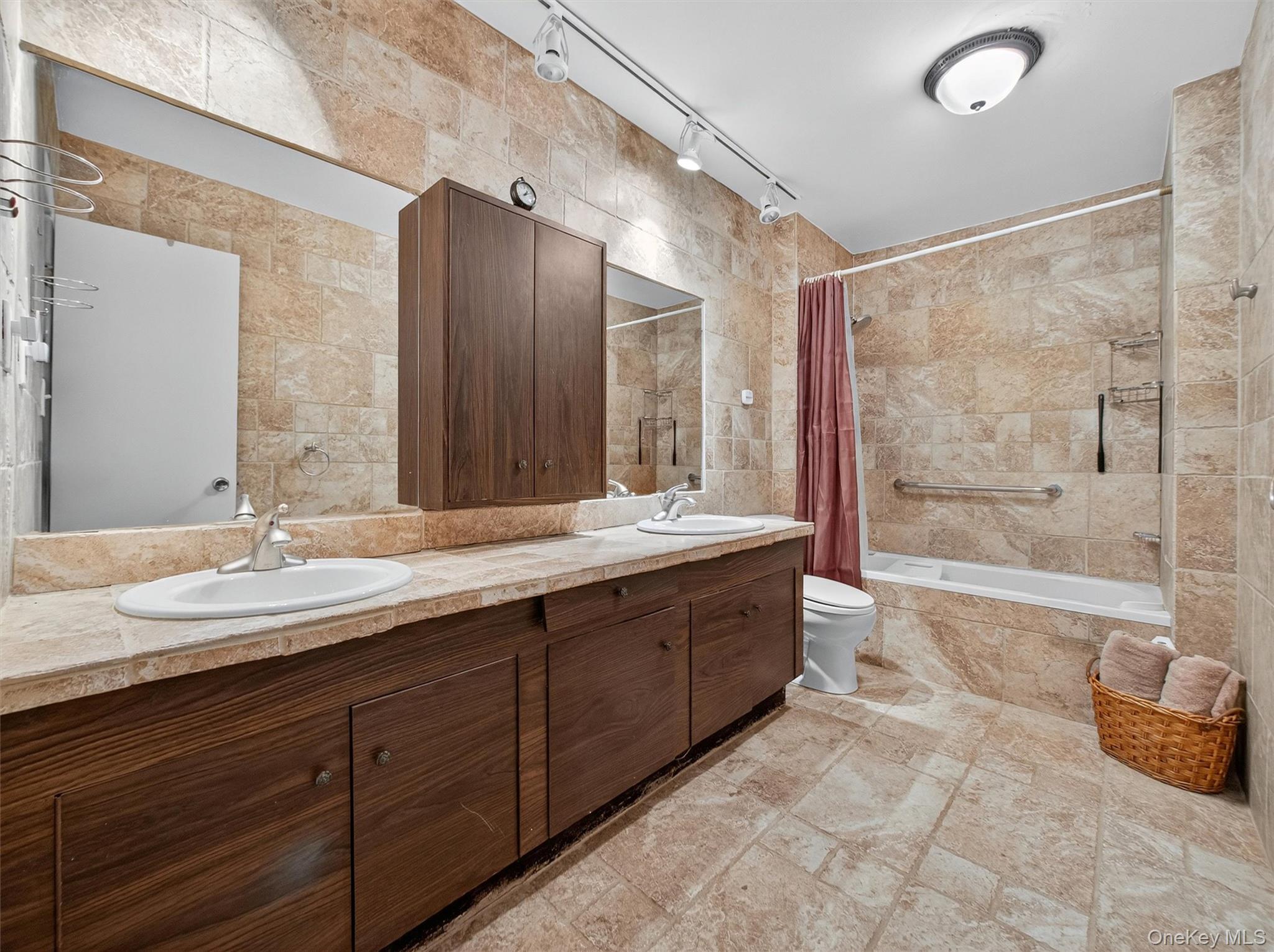 2 Kings Gate Road Suffern, NY 10901 - Photo 36 of 50 a bathroom with a granite countertop sink mirror and bathtub