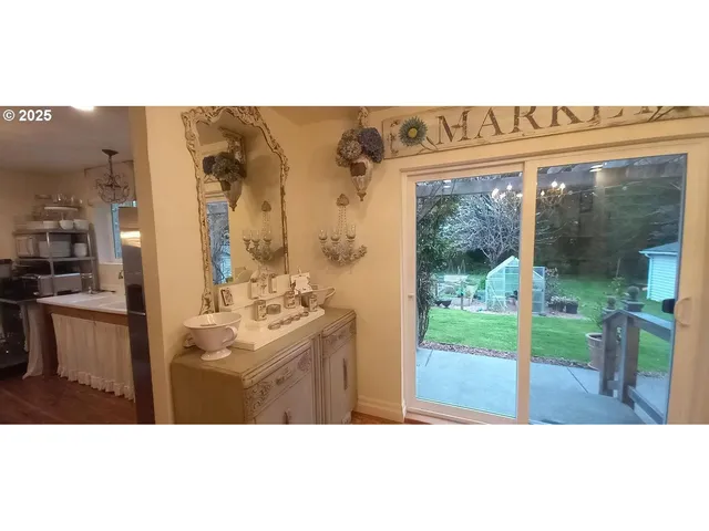 a bathroom with a sink mirror and a bath tub