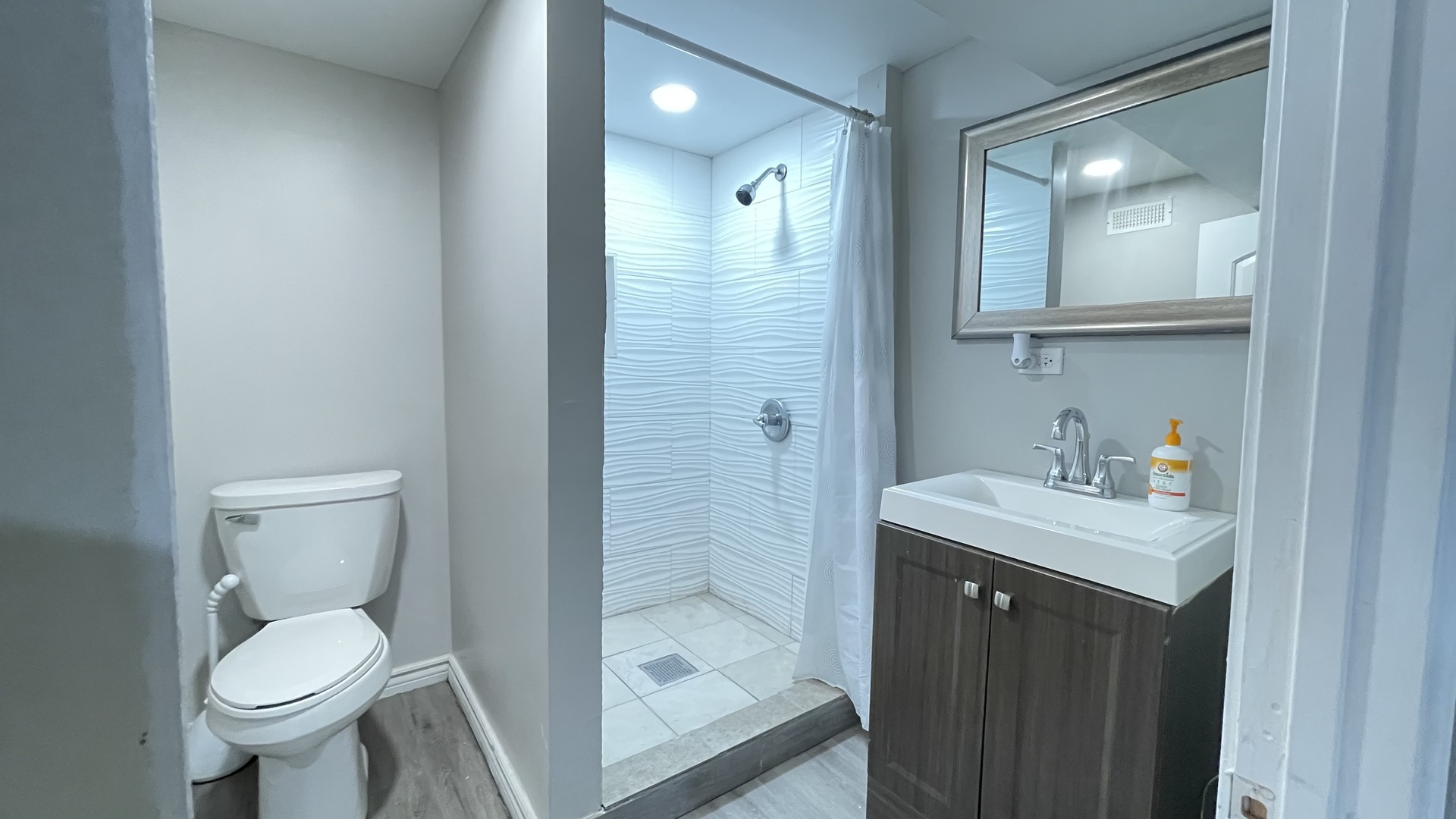 6511 South Vernon Avenue Chicago, IL 60637 - Photo 12 of 12 a bathroom with a sink toilet and shower