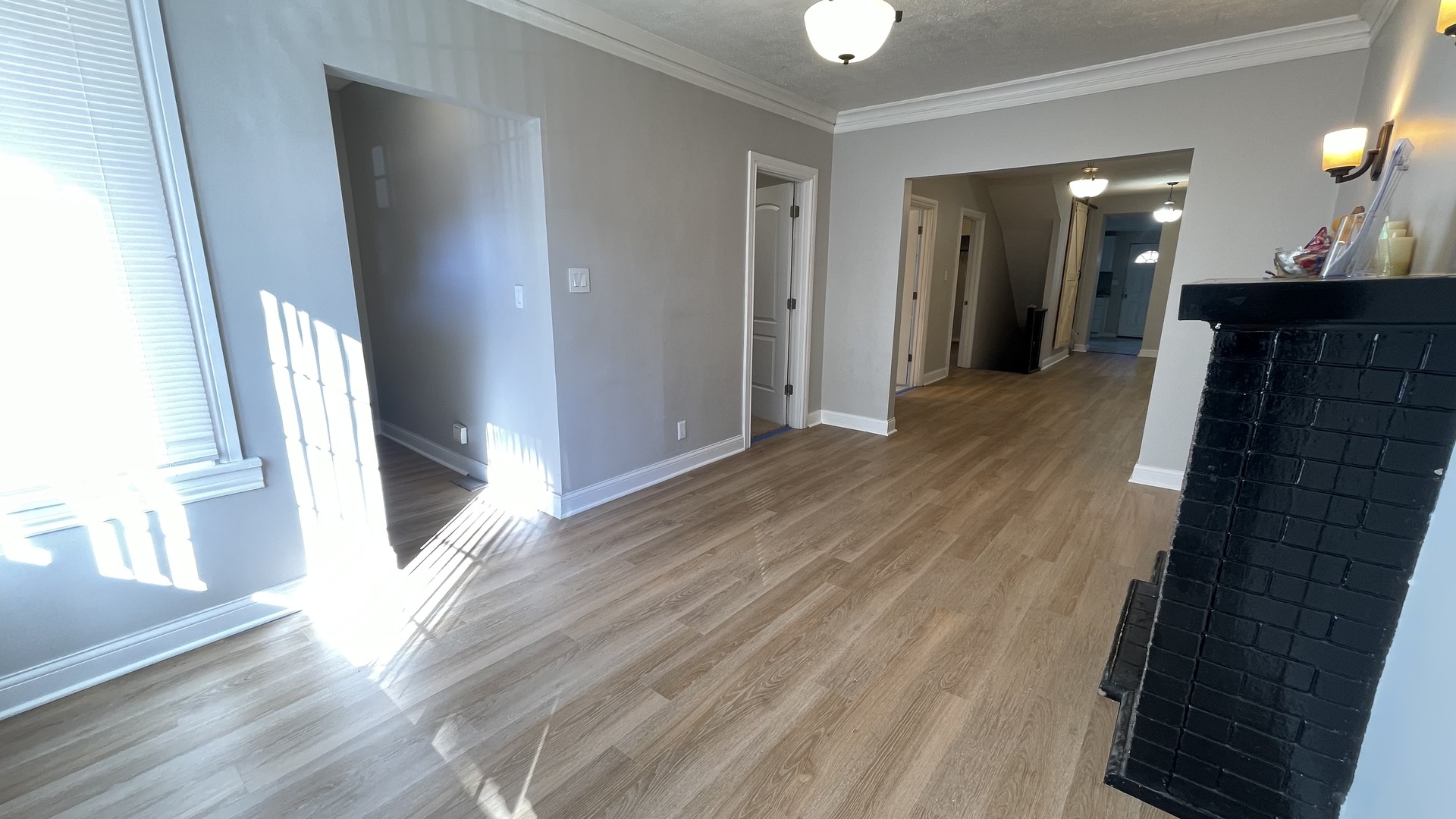 6511 South Vernon Avenue Chicago, IL 60637 - Photo 4 of 12 a view of a hallway with wooden floor and staircase