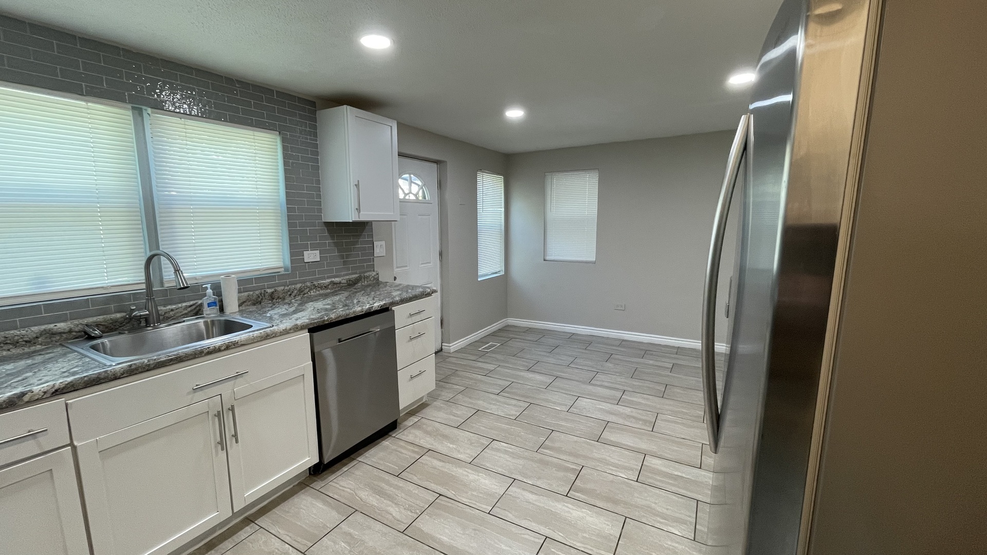 6511 South Vernon Avenue Chicago, IL 60637 - Photo 10 of 12 a bathroom with a sink and a mirror