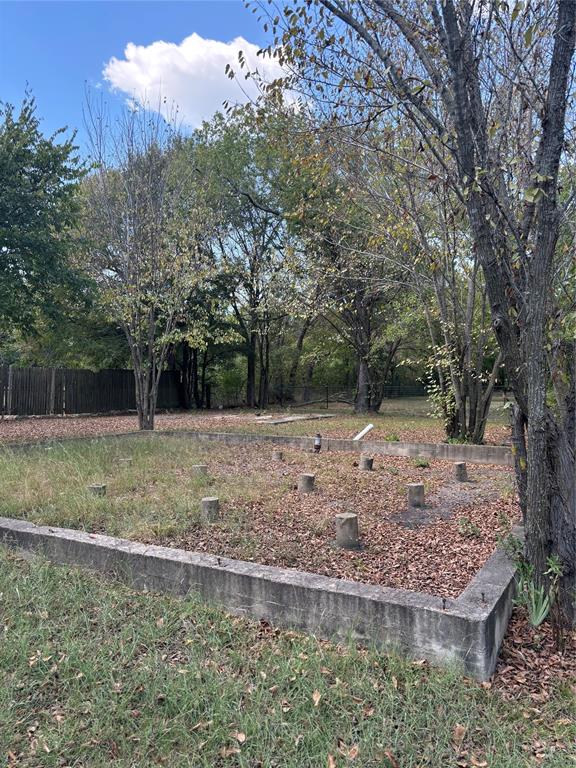 805 Ard Road Seagoville, TX 75159 - Photo 5 of 10 a view of a backyard