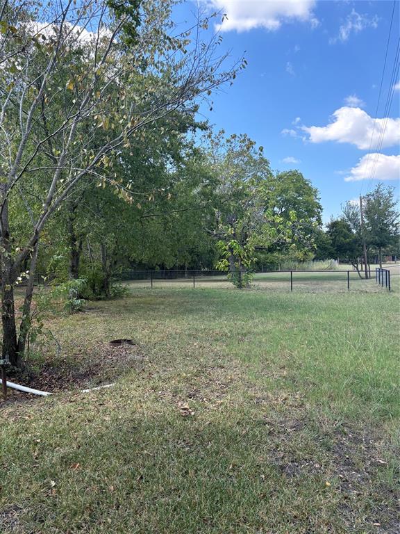 805 Ard Road Seagoville, TX 75159 - Photo 6 of 10 a view of outdoor space with deck and yard