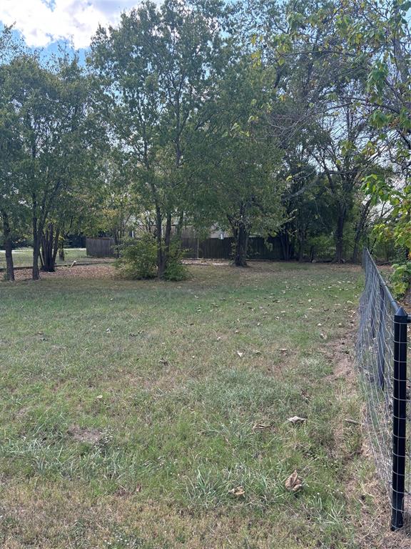 805 Ard Road Seagoville, TX 75159 - Photo 9 of 10 a view of a yard with a trees