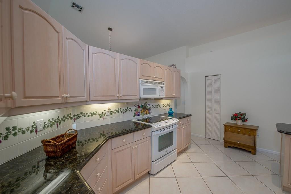 21552 Arbor Way Boca Raton, FL 33433 - Photo 17 of 46 Large Kitchen with Plenty of Cabinets