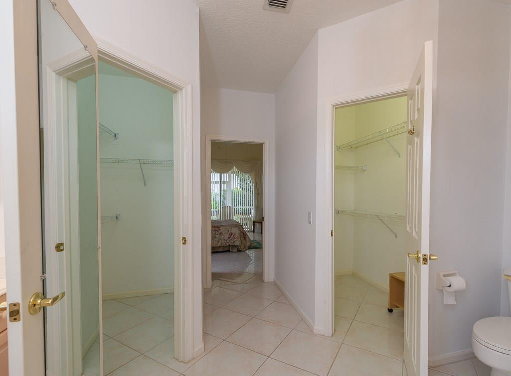 21552 Arbor Way Boca Raton, FL 33433 - Photo 26 of 46 Master Bath with His and Her Closets