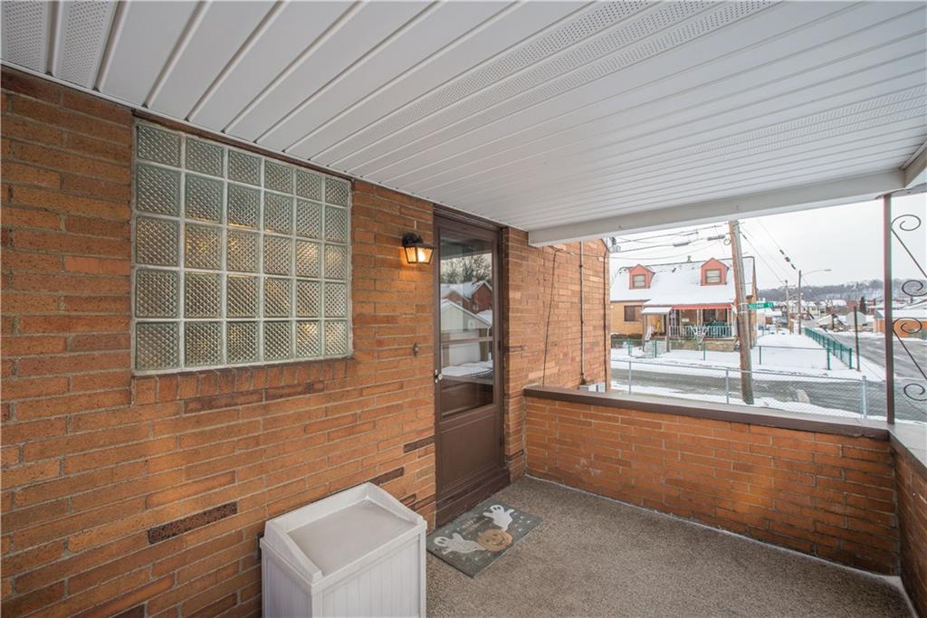 1024 2nd Street McKees Rocks, PA 15136 - Photo 19 of 21 Covered side porch offers outdoor dining/entertaining space!