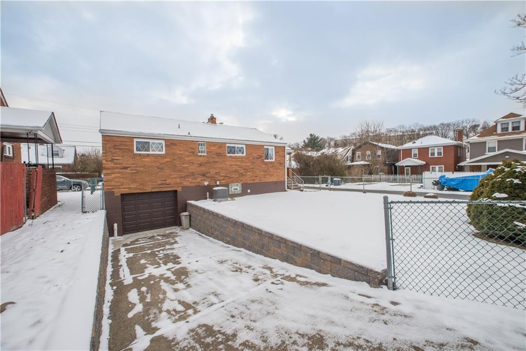 1024 2nd Street McKees Rocks, PA 15136 - Photo 21 of 21 Property includes 1-car car with new garage door and a gorgeous new retaining wall!