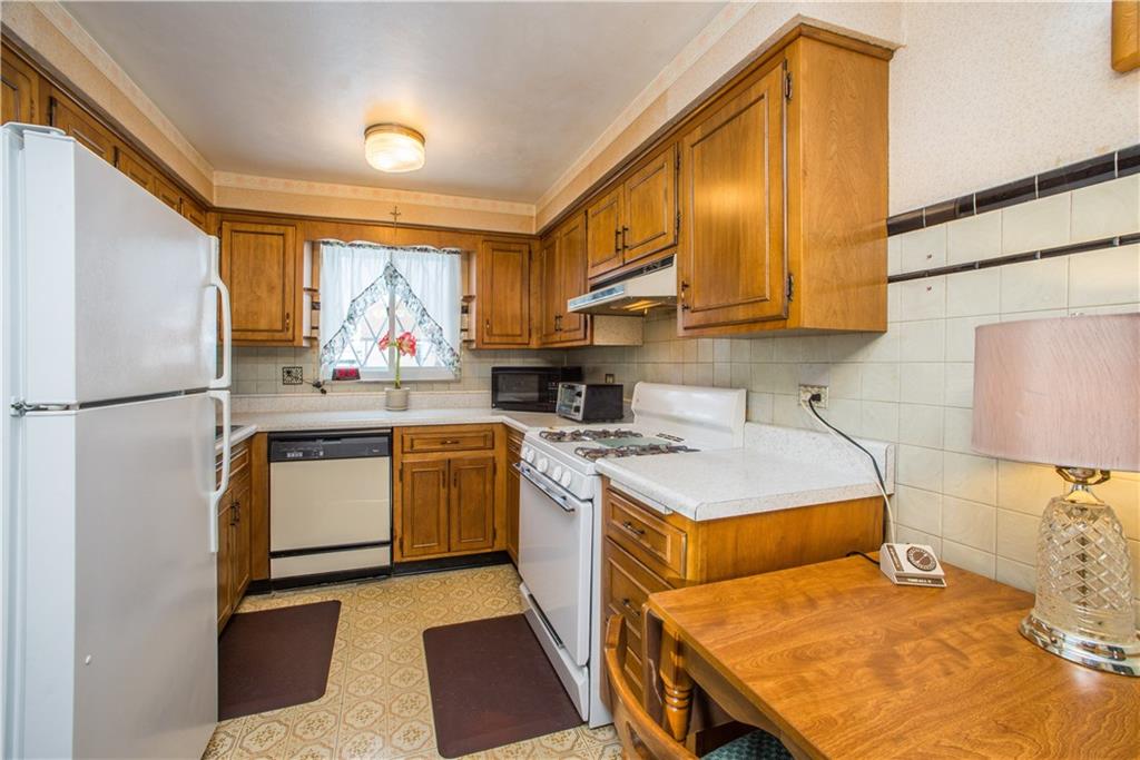 1024 2nd Street McKees Rocks, PA 15136 - Photo 7 of 21 Sale includes gas stove, microwave and refrigerator.