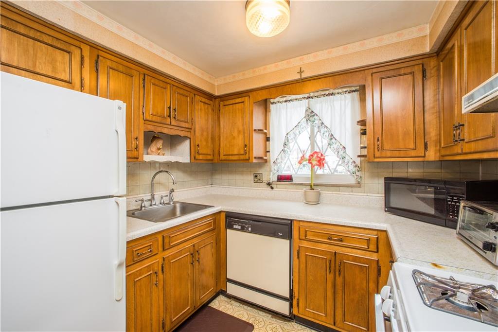 1024 2nd Street McKees Rocks, PA 15136 - Photo 8 of 21 Neutral kitchen dcor allows you to add some accent colors and easily make it your own!