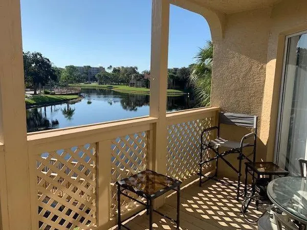 a view of balcony with furniture