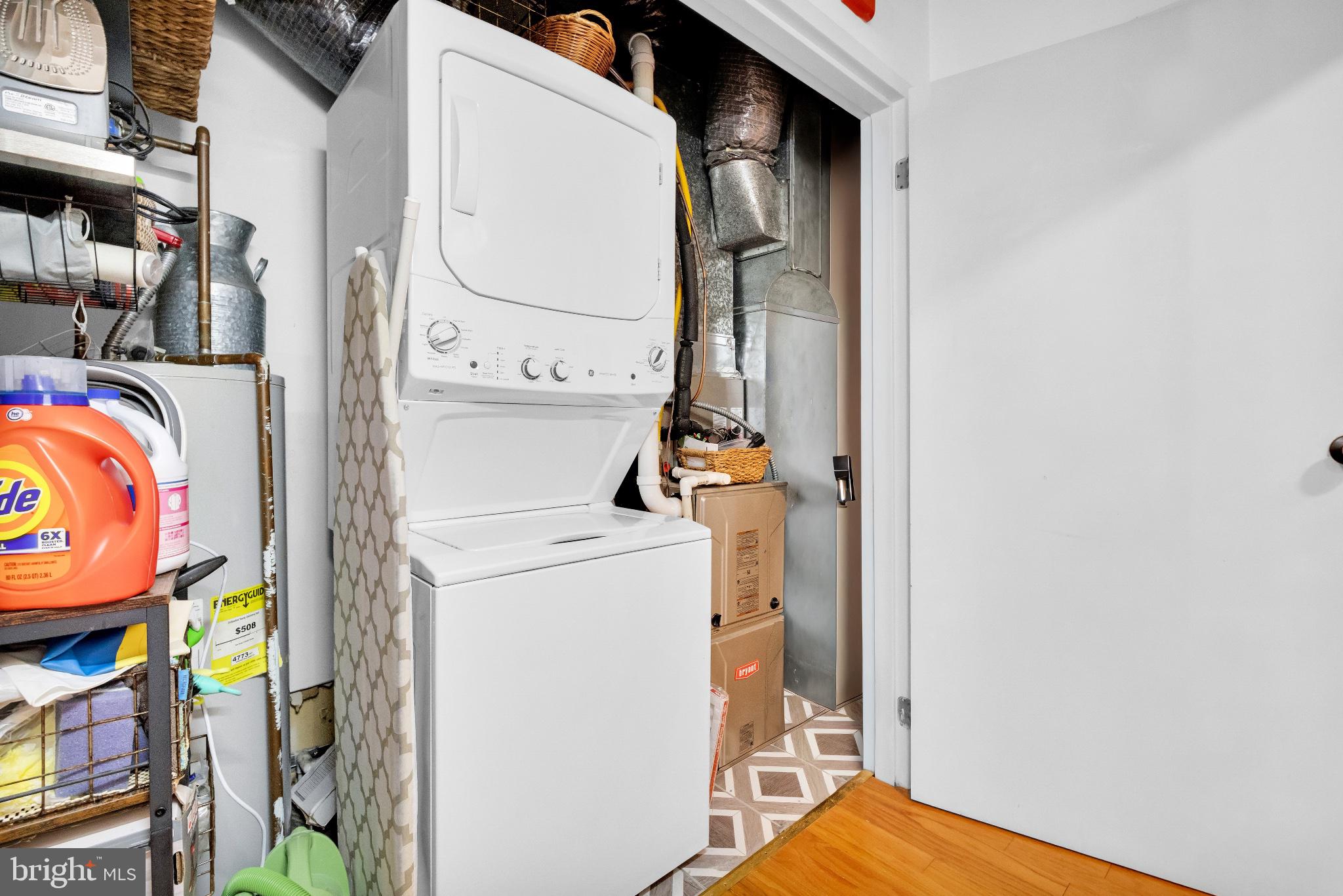 182 Gay Street, Unit 104 Philadelphia, PA 19128 - Photo 12 of 23 a utility room with dryer and washer