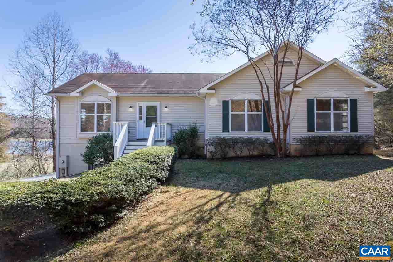 524 West Daffodil Road Ruckersville, VA 22968 - Photo 1 of 29 a front view of a house with a yard and garage