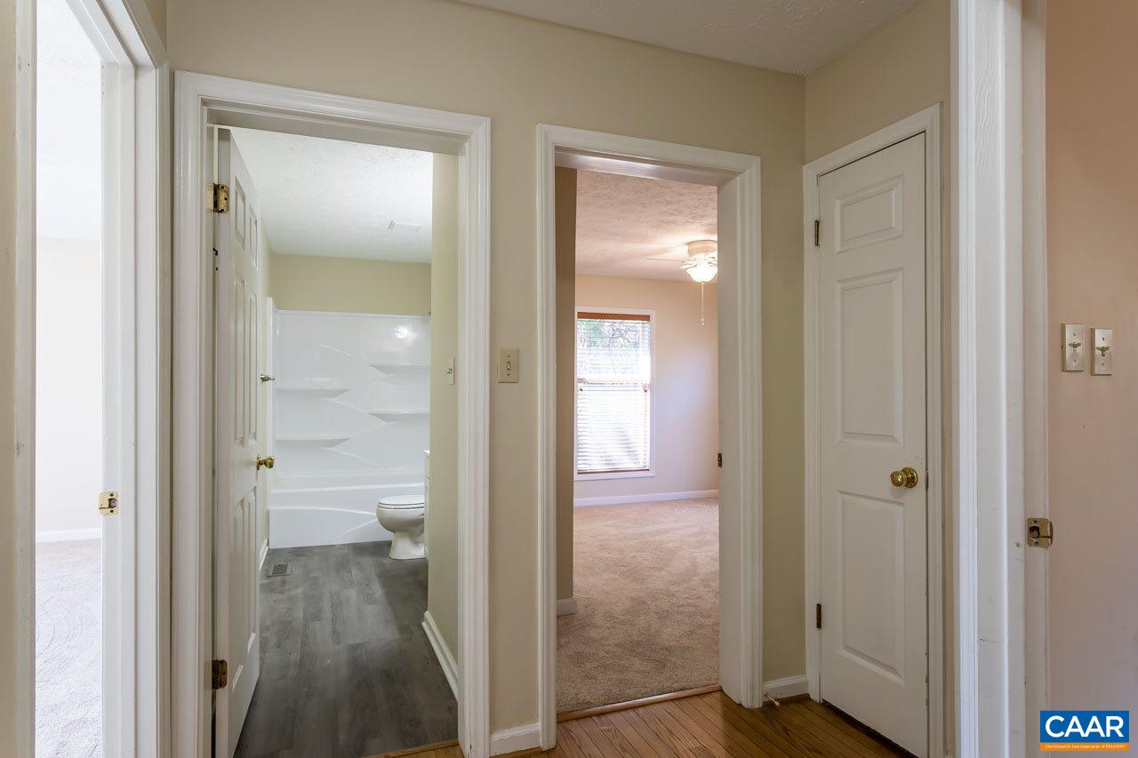 524 West Daffodil Road Ruckersville, VA 22968 - Photo 21 of 29 a bathroom with a glass door shower and a sink