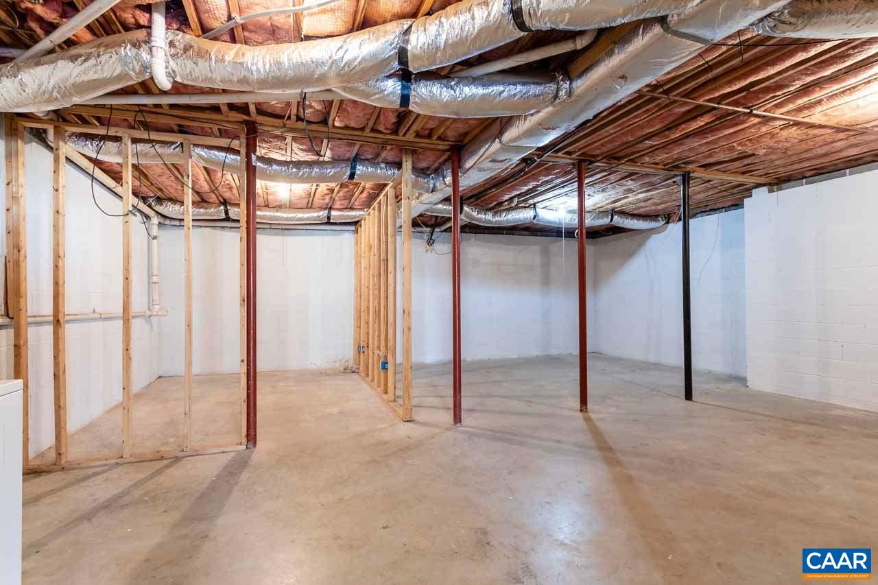 524 West Daffodil Road Ruckersville, VA 22968 - Photo 25 of 29 a view of a room with wooden walls