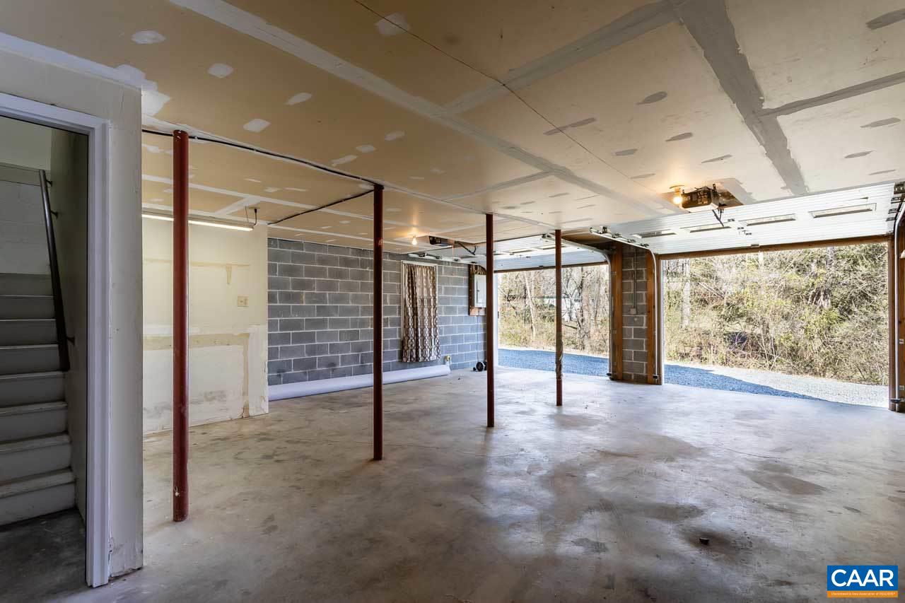 524 West Daffodil Road Ruckersville, VA 22968 - Photo 26 of 29 a view of an empty room with wooden floor
