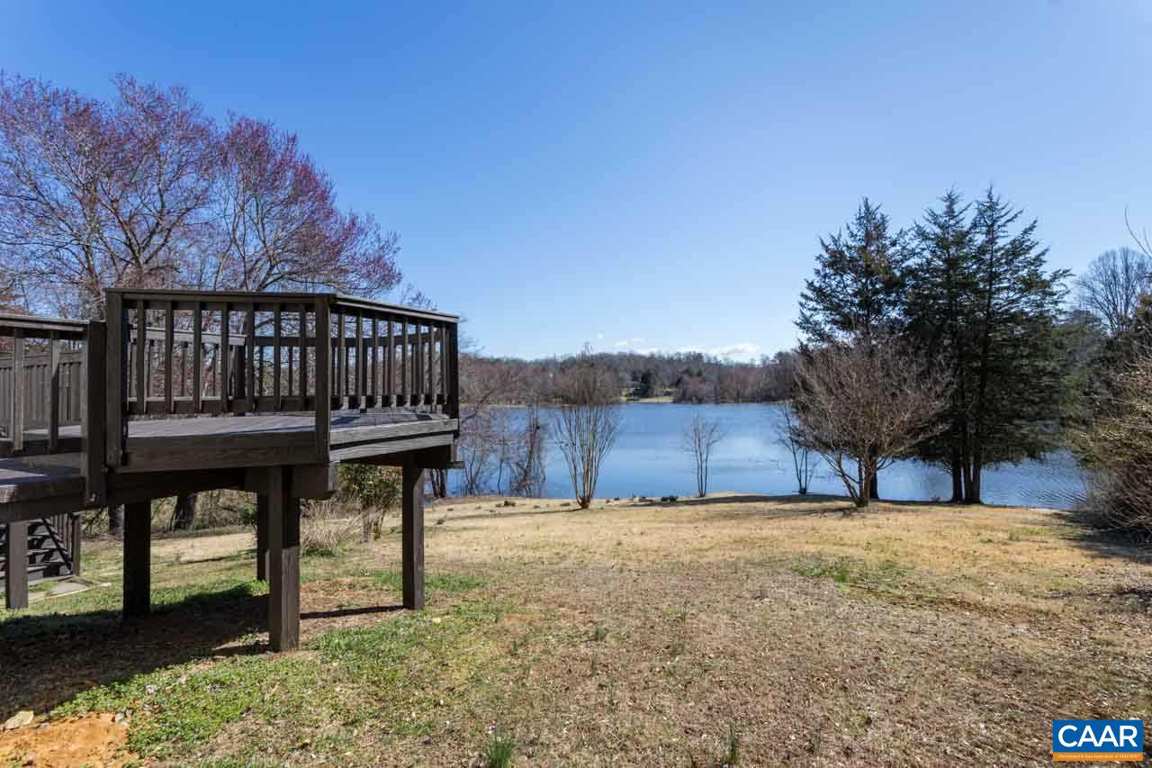 524 West Daffodil Road Ruckersville, VA 22968 - Photo 5 of 29 a view of a house with wooden deck and furniture