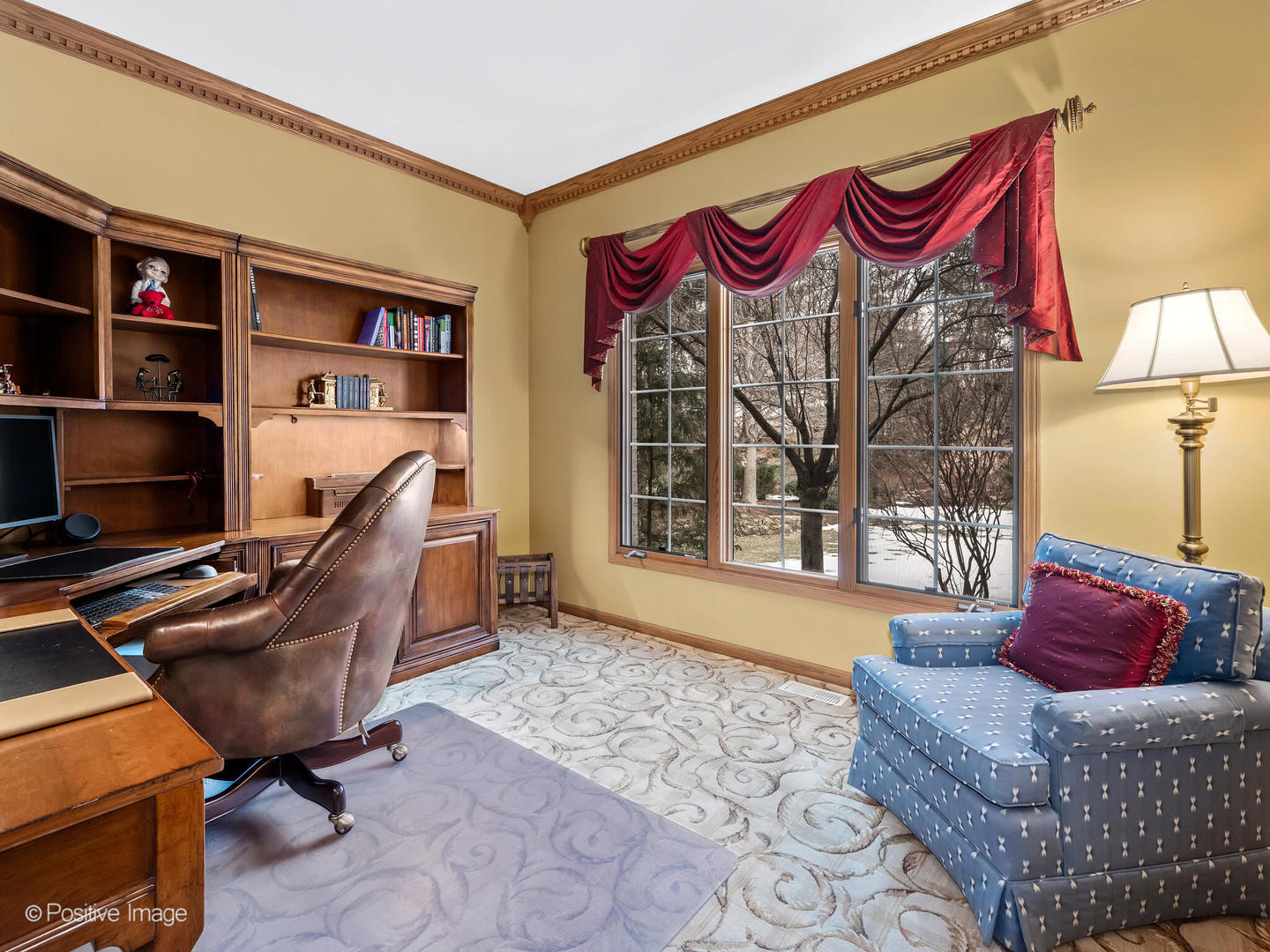 15-w601 81st Street Burr Ridge, IL 60527 - Photo 14 of 42 a living room with furniture a flat screen tv and a window