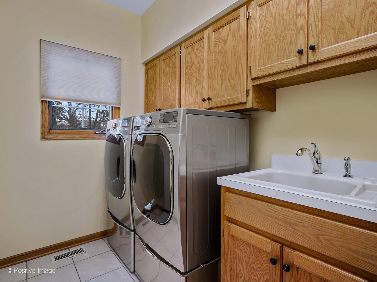 15-w601 81st Street Burr Ridge, IL 60527 - Photo 16 of 42 a utility room with dryer and washer