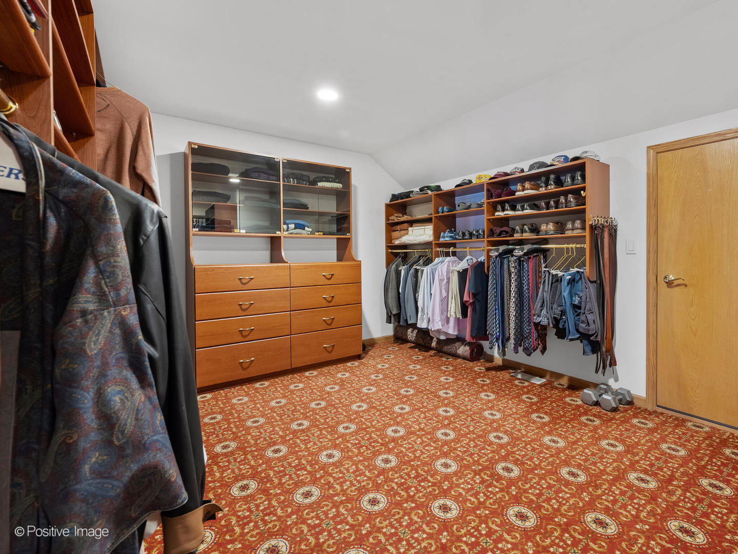 15-w601 81st Street Burr Ridge, IL 60527 - Photo 19 of 42 a view of walk in closet with clothes