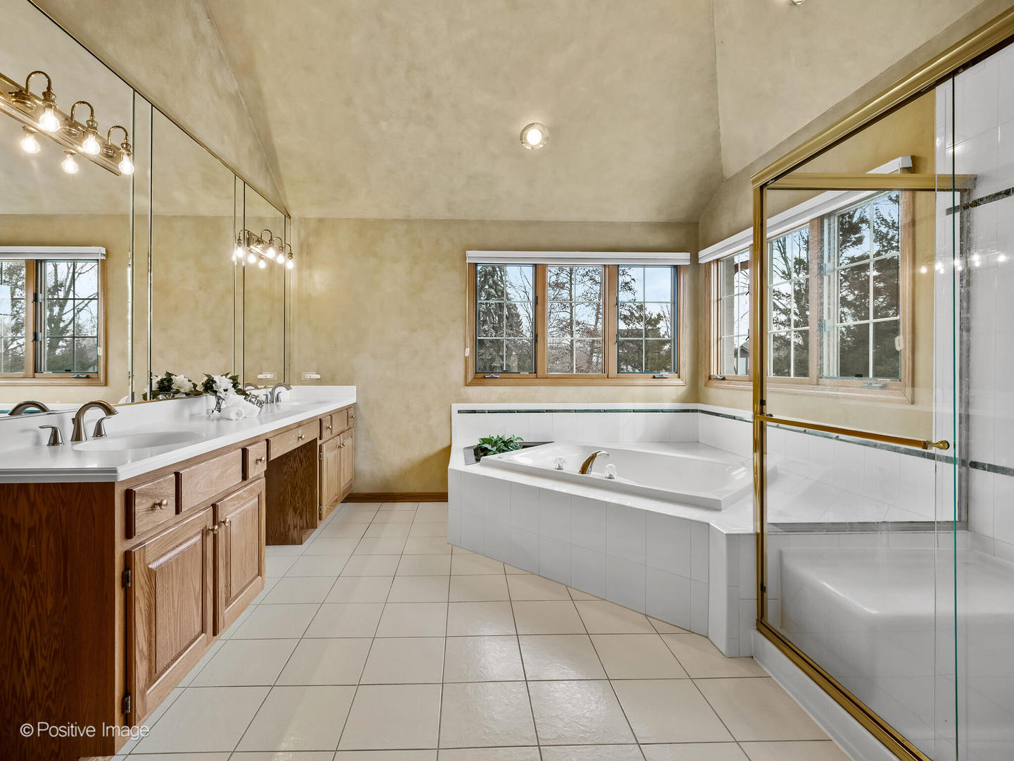 15-w601 81st Street Burr Ridge, IL 60527 - Photo 20 of 42 a bathroom with a tub sink and mirror