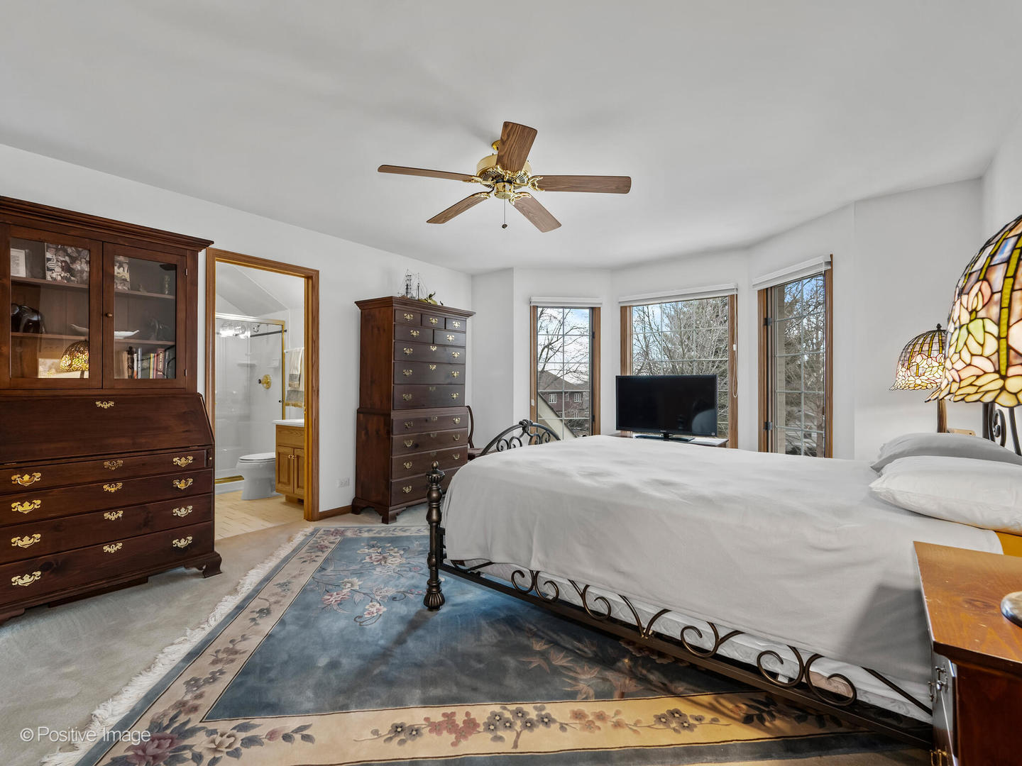 15-w601 81st Street Burr Ridge, IL 60527 - Photo 21 of 42 a bedroom with a bed and wooden floor