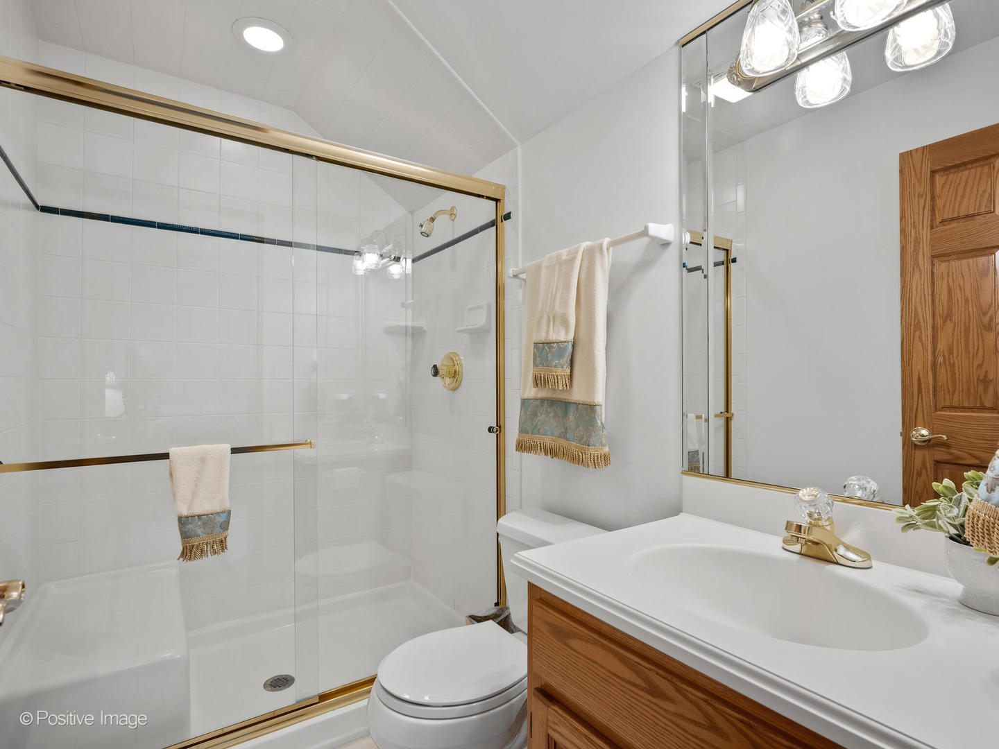 15-w601 81st Street Burr Ridge, IL 60527 - Photo 22 of 42 a bathroom with a sink toilet vanity and shower