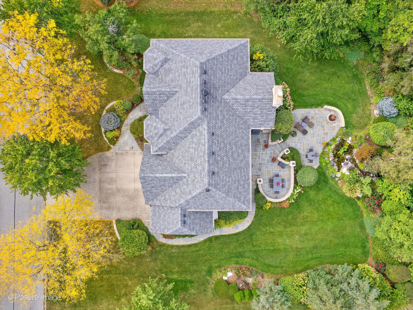 15-w601 81st Street Burr Ridge, IL 60527 - Photo 36 of 42 an aerial view of a house with pool yard and outdoor seating