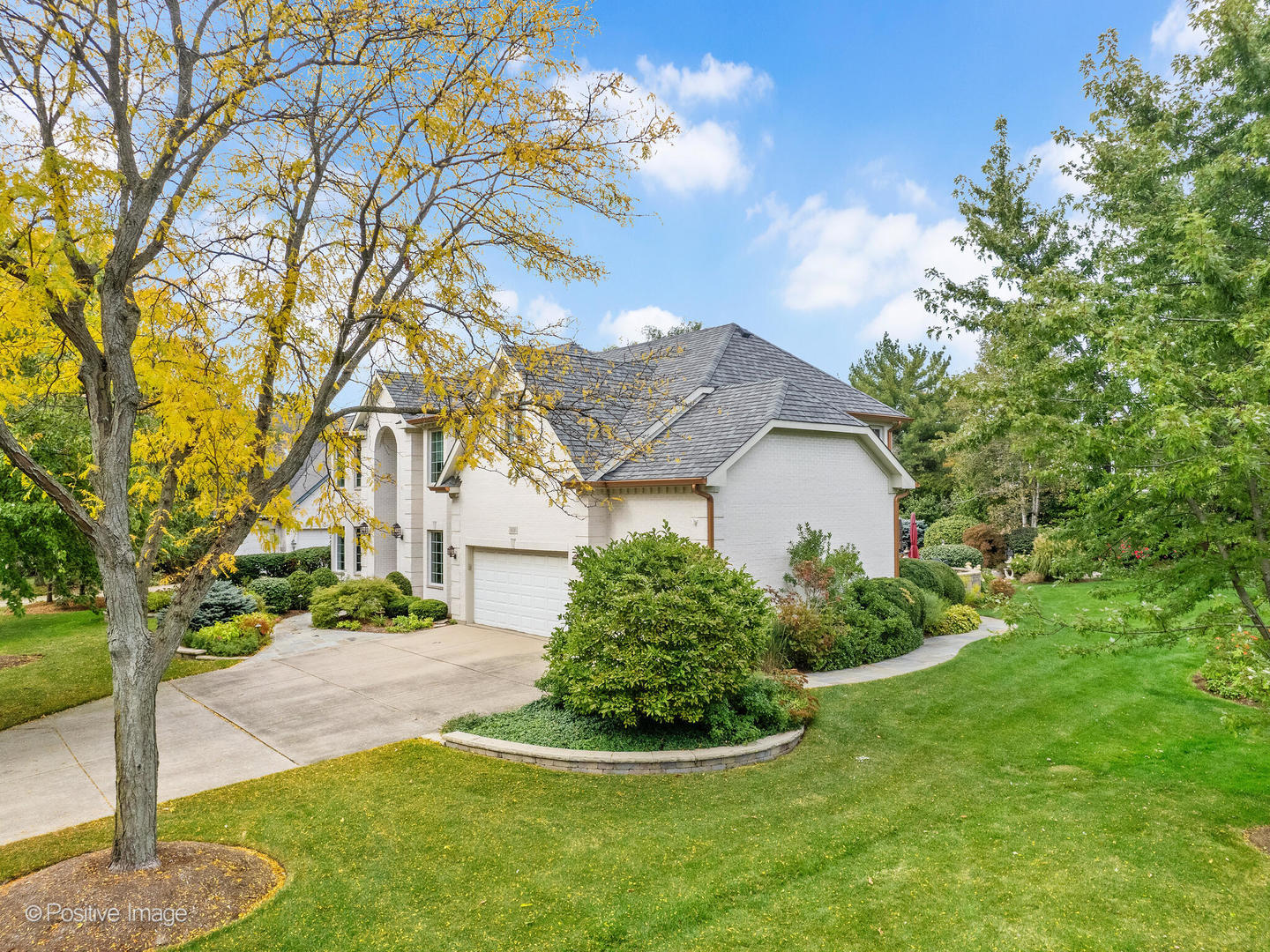 15-w601 81st Street Burr Ridge, IL 60527 - Photo 39 of 42 a front view of a house with garden