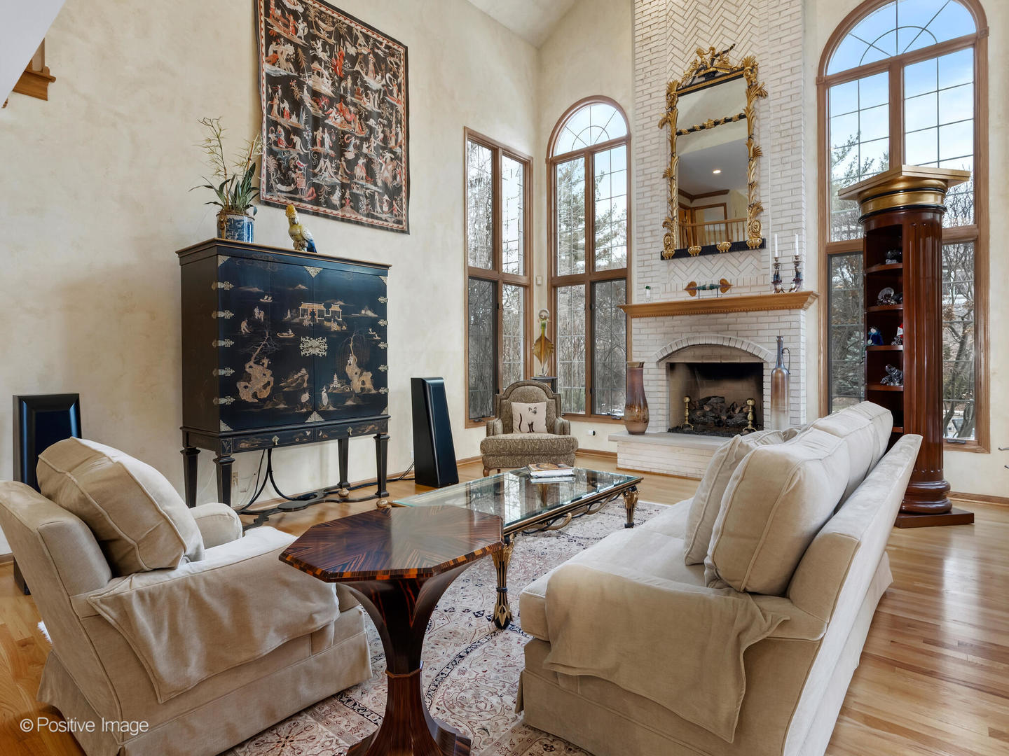 15-w601 81st Street Burr Ridge, IL 60527 - Photo 6 of 42 a living room with furniture or couch and a fireplace