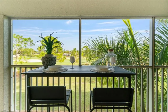 a view of balcony with furniture