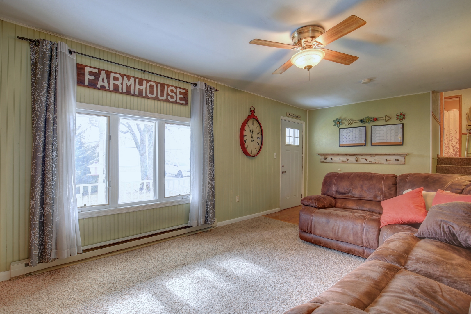 335 Dodge Street Cisco, IL 61830 - Photo 2 of 16 a living room with furniture and a window