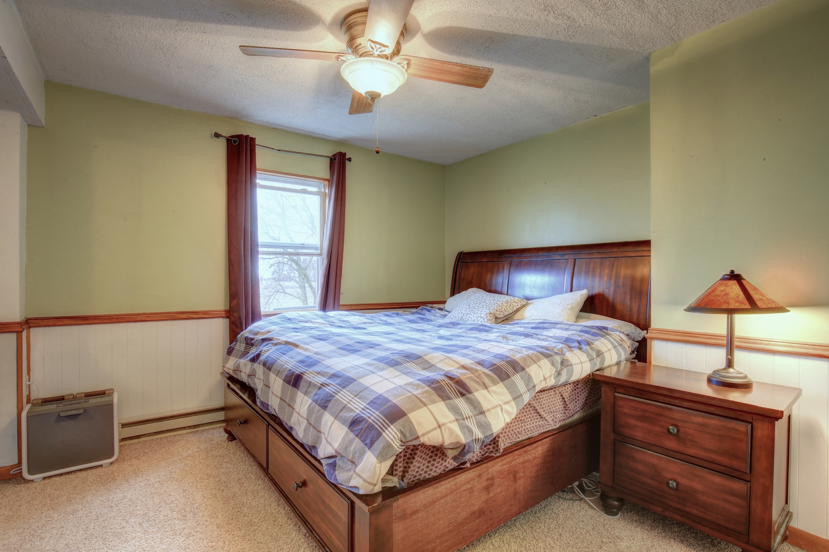 335 Dodge Street Cisco, IL 61830 - Photo 12 of 16 a bedroom with a bed and window