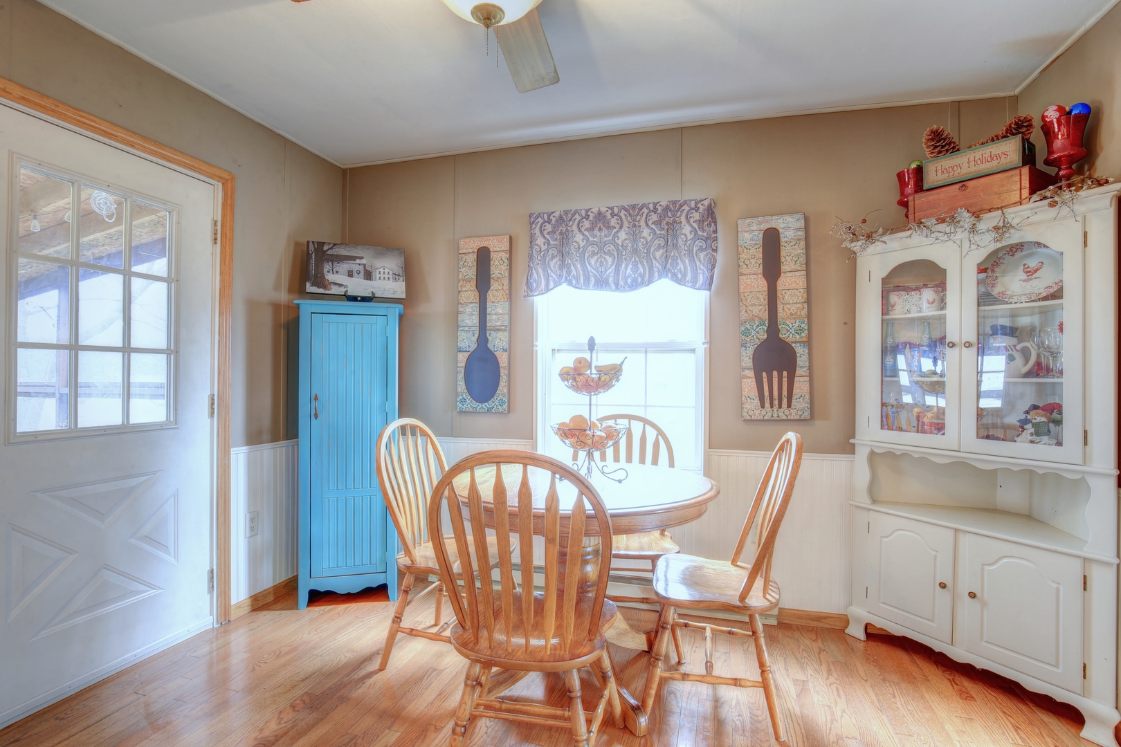 335 Dodge Street Cisco, IL 61830 - Photo 8 of 16 a view of a dining room with furniture and wooden floor