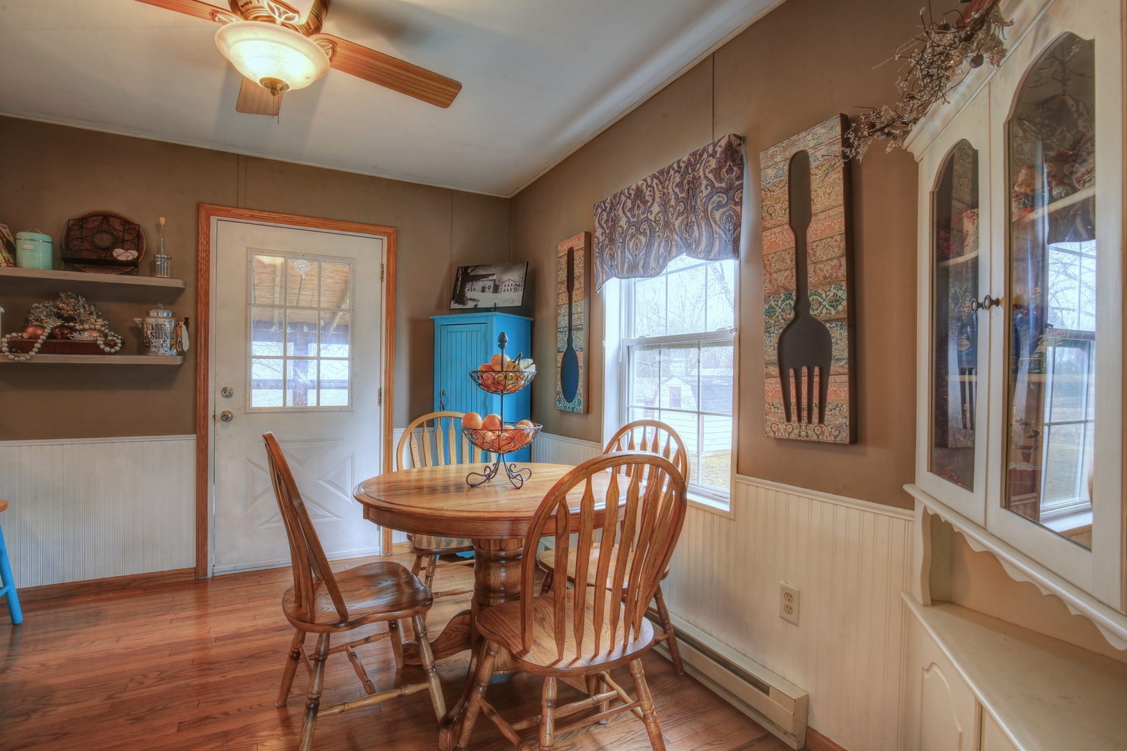 335 Dodge Street Cisco, IL 61830 - Photo 9 of 16 a dining room with furniture and window