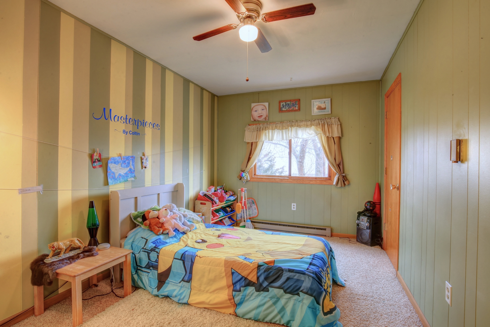 335 Dodge Street Cisco, IL 61830 - Photo 10 of 16 a bedroom with a bed and a window